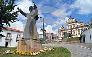 Monument to John Paul II, Paco dos Tavoras in the background, Mirandela, Portugal photo