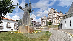Monument to John Paul II, Paco dos Tavoras in the background, Mirandela, Portugal photo