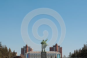 the monument to Lenin in the clear blue sky