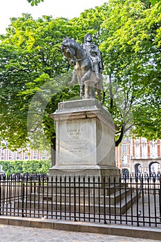 Monument to Louis XIII on Vosges square, Paris, France