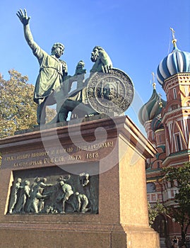 Monument to Minin and Pozharsky on the Red Square in Moscow Russia. Saint Basil`s Cathedral