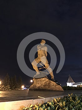 Monument to Musa Jalil near the Kazan Kremlin against the night sky. Republic of Tatarstan, Russia