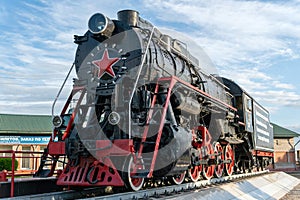 Monument to the old steam locomotive. Such steam locomotives were used in the first half of the 20th century, in the Soviet Union