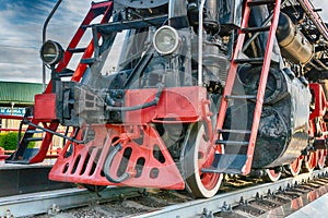 Monument to the old steam locomotive. Such steam locomotives were used in the first half of the 20th century, in the Soviet Union