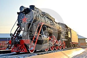 Monument to the old steam locomotive. Such steam locomotives were used in the first half of the 20th century, in the Soviet Union