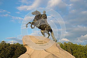 Monument to Peter the Great Bronze Horseman in the background of the cloudy sky in the evening in August. St. Petersburg, Russia