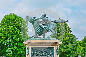 The Monument to Prince Ferdinand of Savoy with blooming chestnut trees in background, Piazza Solferino square, Turin, Italy