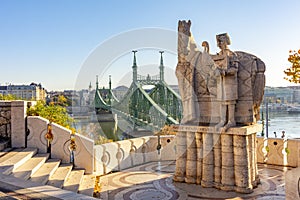 Monument to Saint Istvan on Gellert mountain with Elisabeth Erzsebet bridge over Danube river in Budapest, Hungary translation