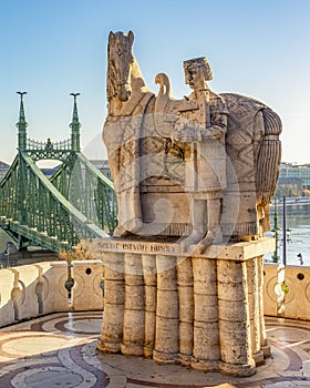 Monument to Saint Istvan on Gellert mountain with Elisabeth (Erzsebet) bridge over Danube river in Budapest, Hungary