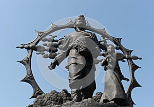 A monument to the settlers in the Altai on the square of October in Barnaul.