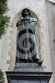 The monument of Urlich Zwingli in the center of Zurich photo