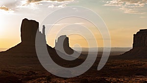 Monument Valley Desert Beyond West East Mitten and Merrick Butte Sunrise Time Lapse Arizona