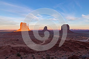 Monument Valley Landscape at Sunset - West Mitten Butte, East Mitten Butte and Merrick Butte