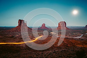 Monument Valley with light trails at night, Arizona, USA