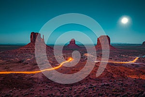 Monument Valley with light trails at night, Arizona, USA