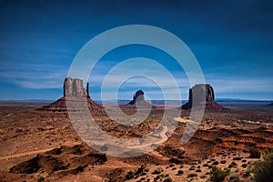 Monument Valley in moonlight on a starry night, Arizona, USA