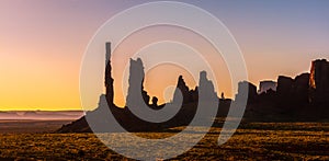 Monument Valley scenery at sunrise. Totem Pole and Yei Bi Chei rocky spires landscape. Monument Valley Navajo Tribal Park, USA