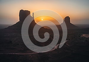 Monument Valley USA Utah during Sunset and sunrise with famout view to the sisters and west mitten butte