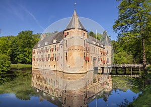 Monumental castle in Apeldoorn surrounded by a moat