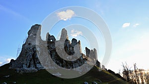 Monumental castle Hrusov, view from northern side, sunbathing in winter evening sunshine.