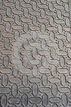 Monumental door detail in the historic of Cordoba Spain