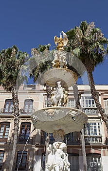 Monumental fountain at Constitucion Square, Malaga Spain photo