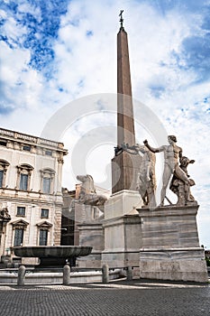 Monumental fountain of the Dioscuri with an ancient Egyptian obelisk above it in the Piazza del Quirinale in Rome