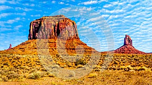 Monumental red sandstone formations of Merrick Butte and East Mitten Butte in Navajo Nation`s Monument Valley Navajo Tribal Park