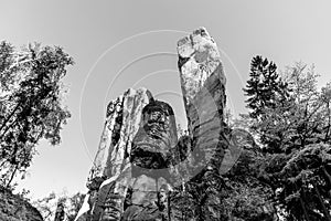 Monumental sandstone rock formation in the miidle of spring forest of Bohemian Paradise, Czech: Cesky raj, Czech