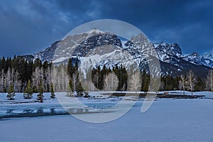 Moody Clouds Over Wintry Mountains