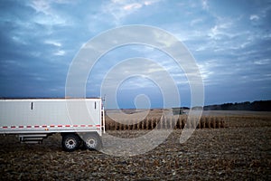 Moody landscape of a maize field during harvest