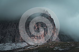 Moody mountain that hides behind the clouds