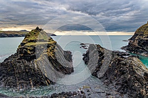 Moody skies and a dramatic rocky coastline in Pembrokeshire, Wales