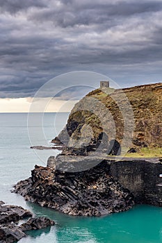 Moody skies and a dramatic rocky coastline in Pembrokeshire, Wales