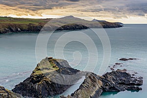 Moody skies and a dramatic rocky coastline in Pembrokeshire, Wales