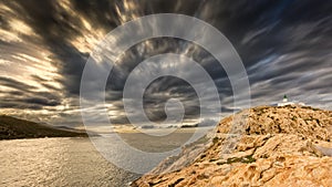 Moody skies over the lighthouse at Ile Rousse in Corsica