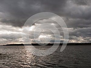 moody sky clouds autumn winter grey dark bay ocean river estuary