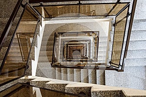 A moody stairwell taken from the top view