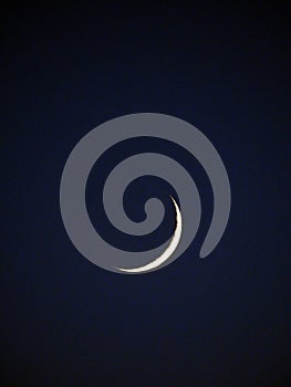 4 percent illuminated moon phase in night sky