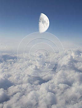 Moon above clouds.