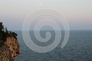 The moon and blue sea photo