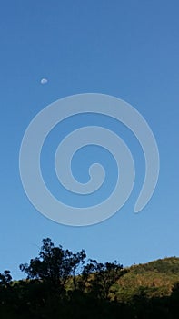 Moon on blue sky