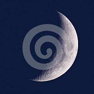 Half Moon in night blue sky