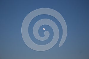 Moon in blue sky