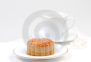 Moon cake served with tea