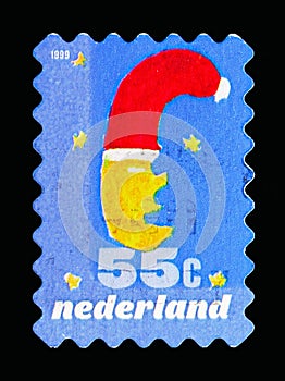 Moon with Christmas hat, December stamps serie, circa 1999