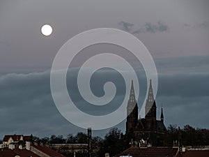 moon in the city in the late evening