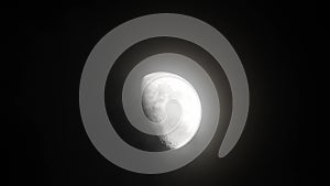 Moon with clouds in the night sky. Cloudy weather on a autumn night. Mysterious night sky with moon. Spooky night and mystery. Dr