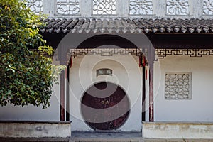 Moon gate at Humble Administrator`s Garden, Suzhou, China