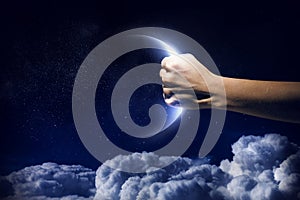 Moon in hand . Mixed media